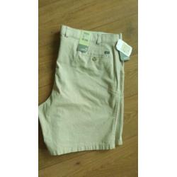 Mooie beige korte broek met stretchband mt. 62 - nieuw