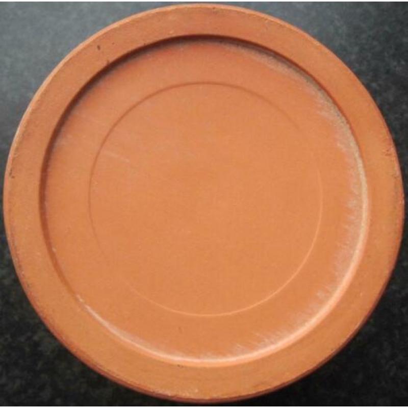 donker beige bloempot met rood-oranje binnenkant