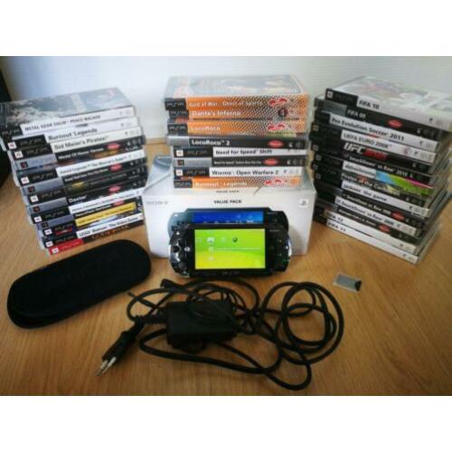 Sony psp met 39 spellen, 2 memory cards en doos