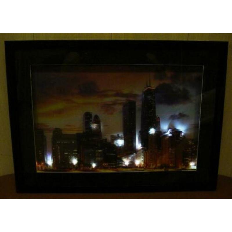 Fotolijst met de skyline van Chicago met verlichting