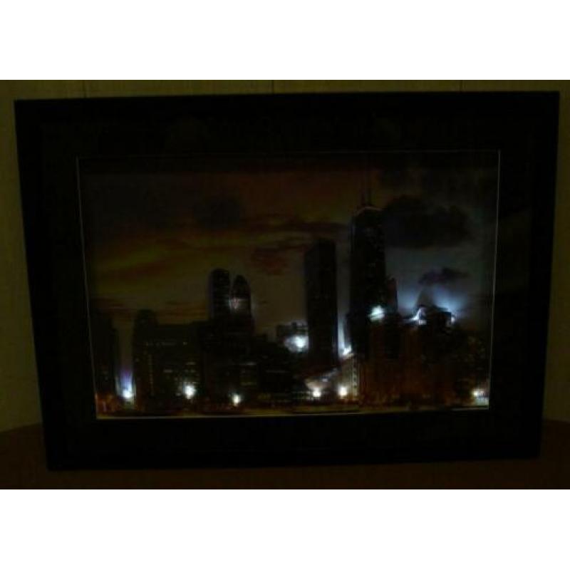 Fotolijst met de skyline van Chicago met verlichting