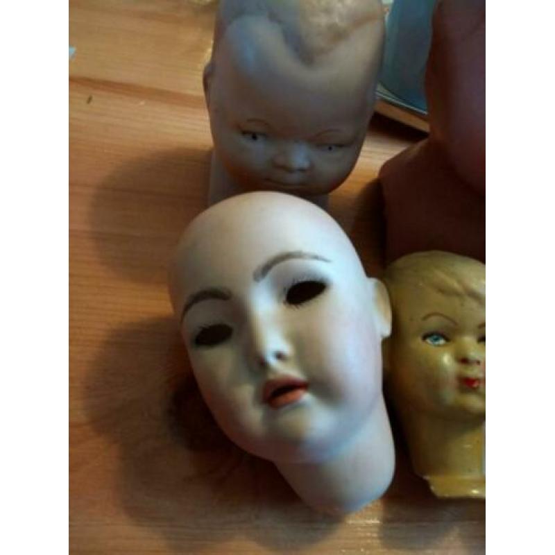 Oude poppen hoofdjes 7x