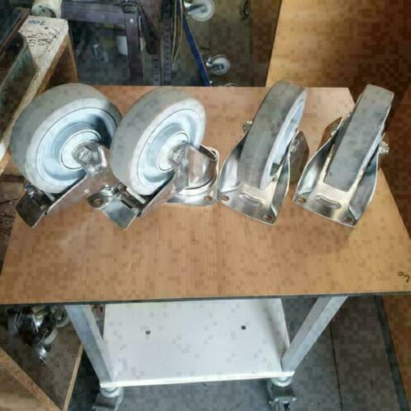 set zware prof. geremde RVS zwenkwielen en bokwielen 160 mm
