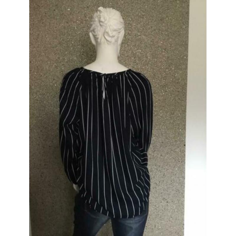 Trendy blauw/ witte top