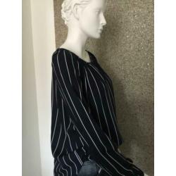 Trendy blauw/ witte top