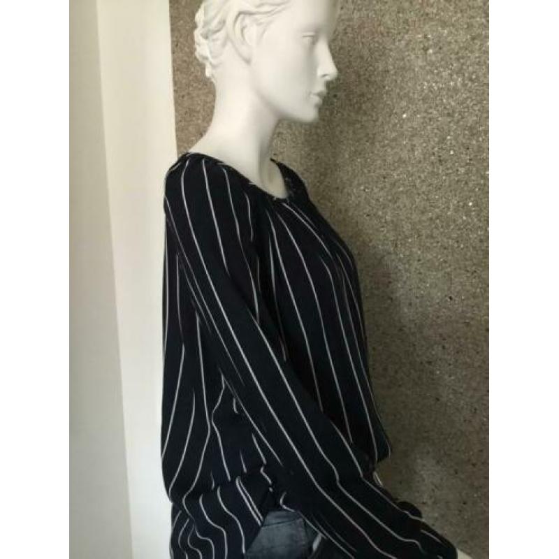 Trendy blauw/ witte top