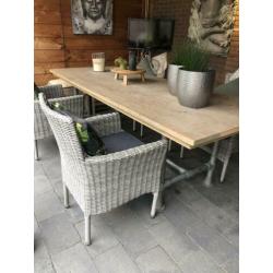 Mooie steigerhouten tuintafel met 5 stoelen
