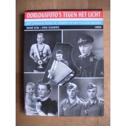 boek - Oorlogsfoto's tegen het licht - Rene Kok / Den Haag
