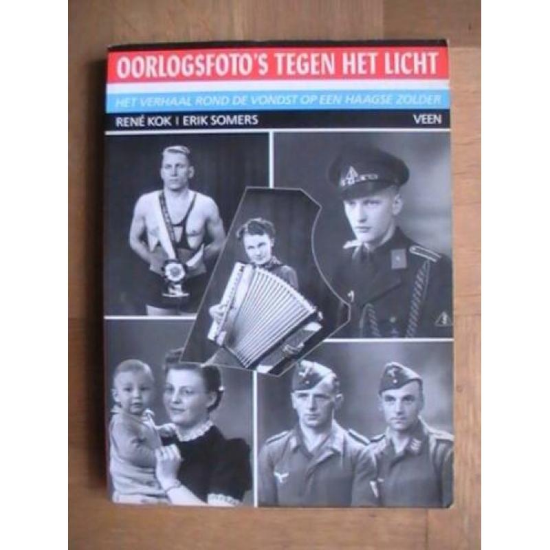 boek - Oorlogsfoto's tegen het licht - Rene Kok / Den Haag