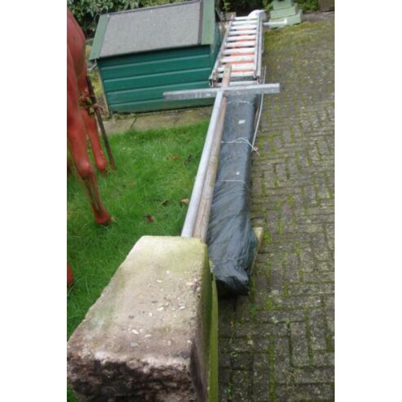 waslijn, carportpalen, buizen met betonvoet