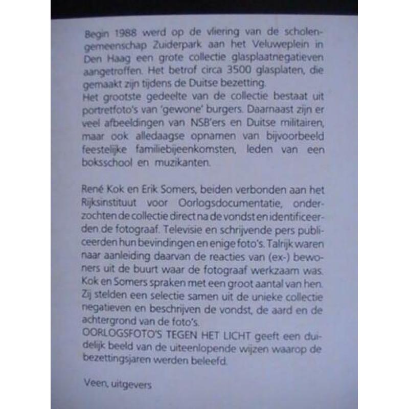 boek - Oorlogsfoto's tegen het licht - Rene Kok / Den Haag