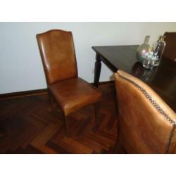 te koop 4 mooie leren eetkamerstoelen