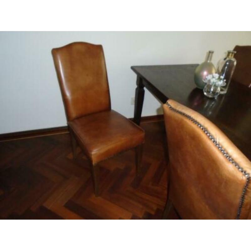 te koop 4 mooie leren eetkamerstoelen