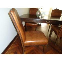 te koop 4 mooie leren eetkamerstoelen