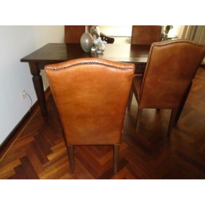 te koop 4 mooie leren eetkamerstoelen
