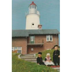 Urk daar komt vader vuurtoren wasdag haven met kotter uk 93