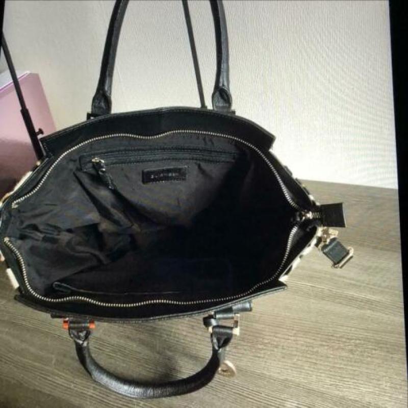 Tas