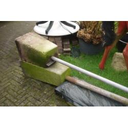 waslijn, carportpalen, buizen met betonvoet