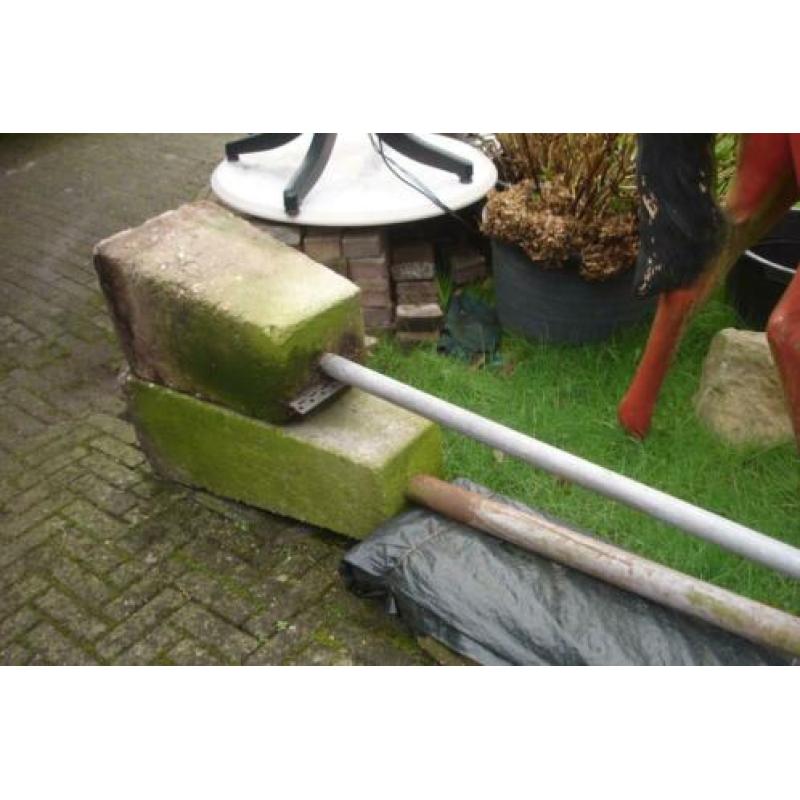 waslijn, carportpalen, buizen met betonvoet