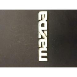 Vintage auto emblemen/stuk