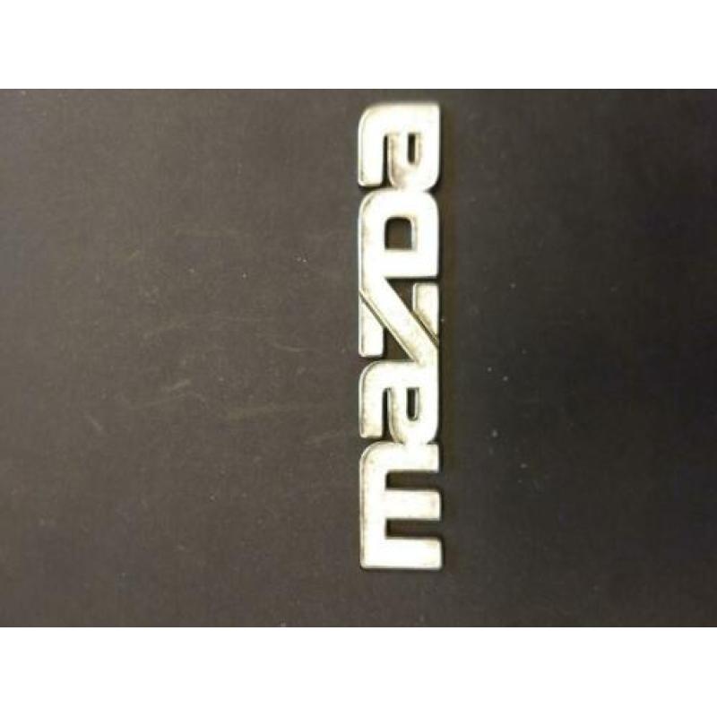Vintage auto emblemen/stuk