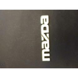 Vintage auto emblemen/stuk