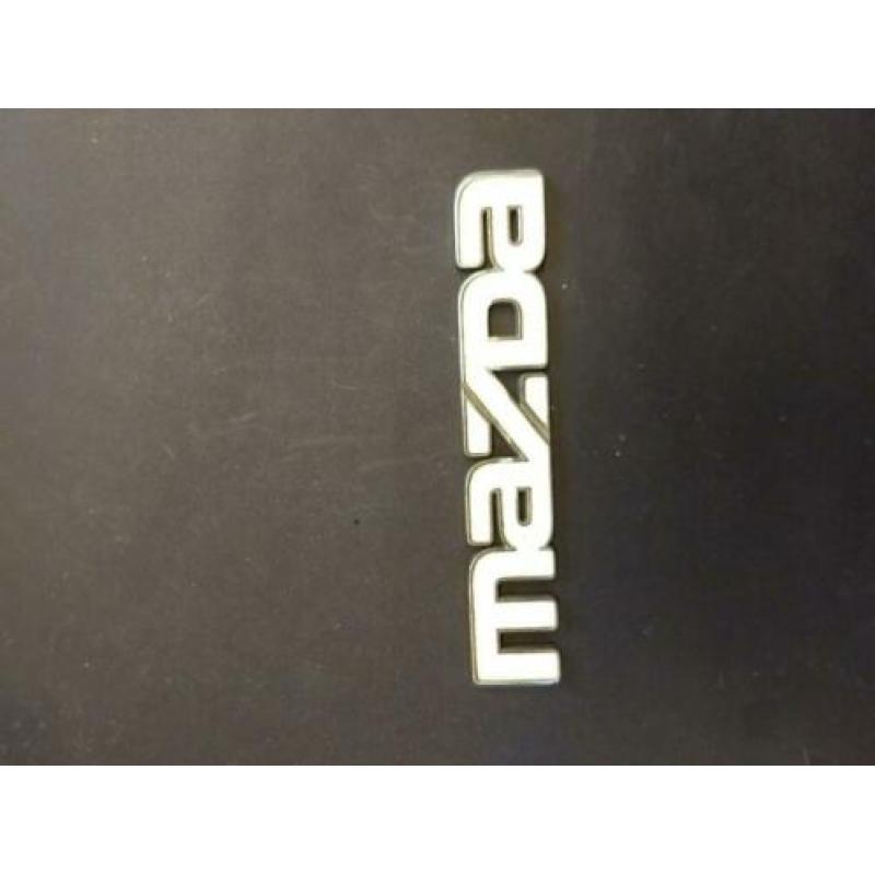 Vintage auto emblemen/stuk