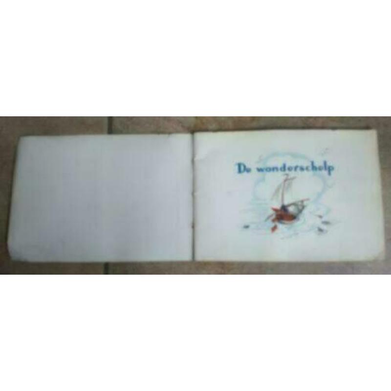 102. Antiek plaatjes album boek de wonderschelp Van Nelle