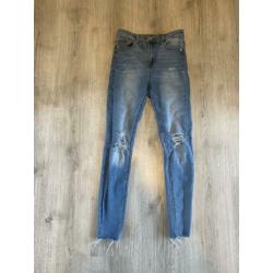 Lichtblauwe high waist skinny jeans van Stradivarius