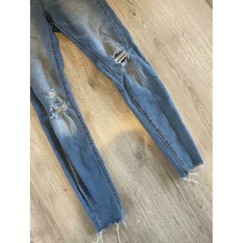 Lichtblauwe high waist skinny jeans van Stradivarius