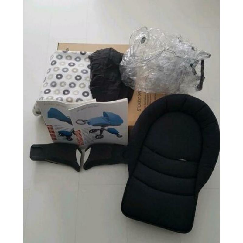 Stokke Xploy compleet + Maxi cosi cabrio fix en adapter